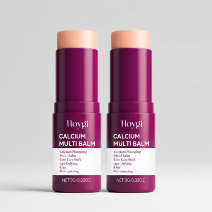 Two Hoygi Calcium Multi Balm sticks on a white background